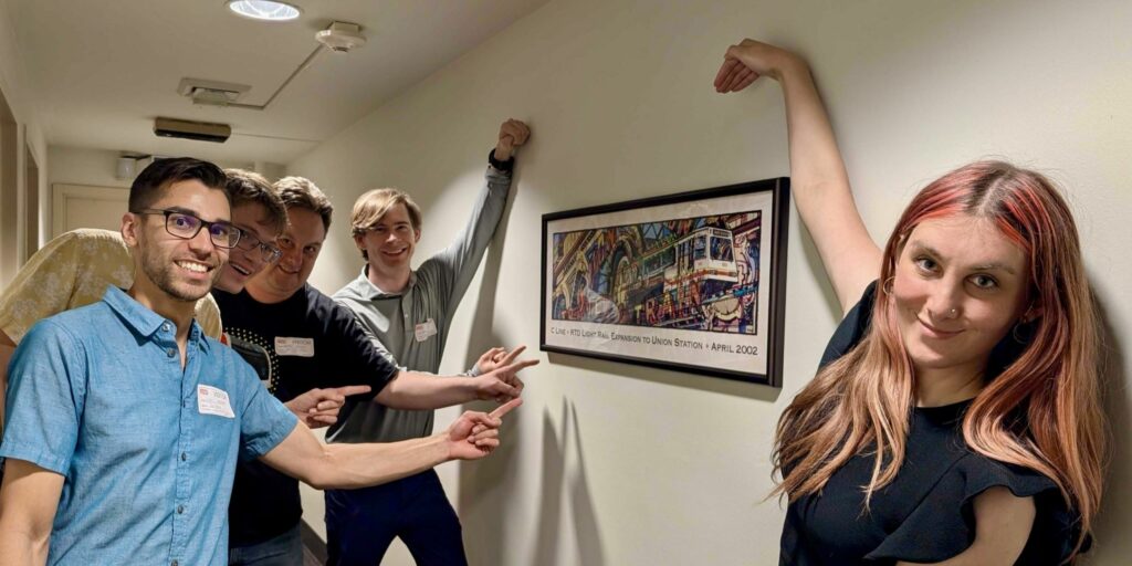 GDT members and some C Line artwork inside RTD's HQ.