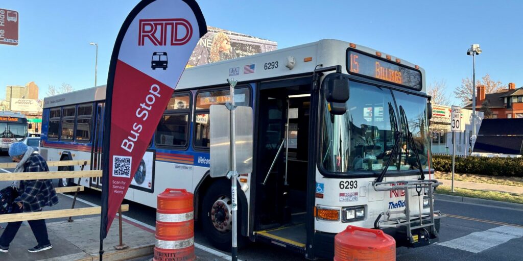 Route 15 bus at a temporary bus stop at Colfax Ave & Race St, Denver.
