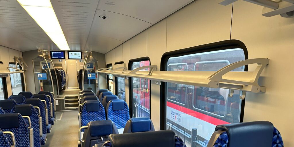 Overhead luggage rack, TexRail Stadler FLIRT EMU.